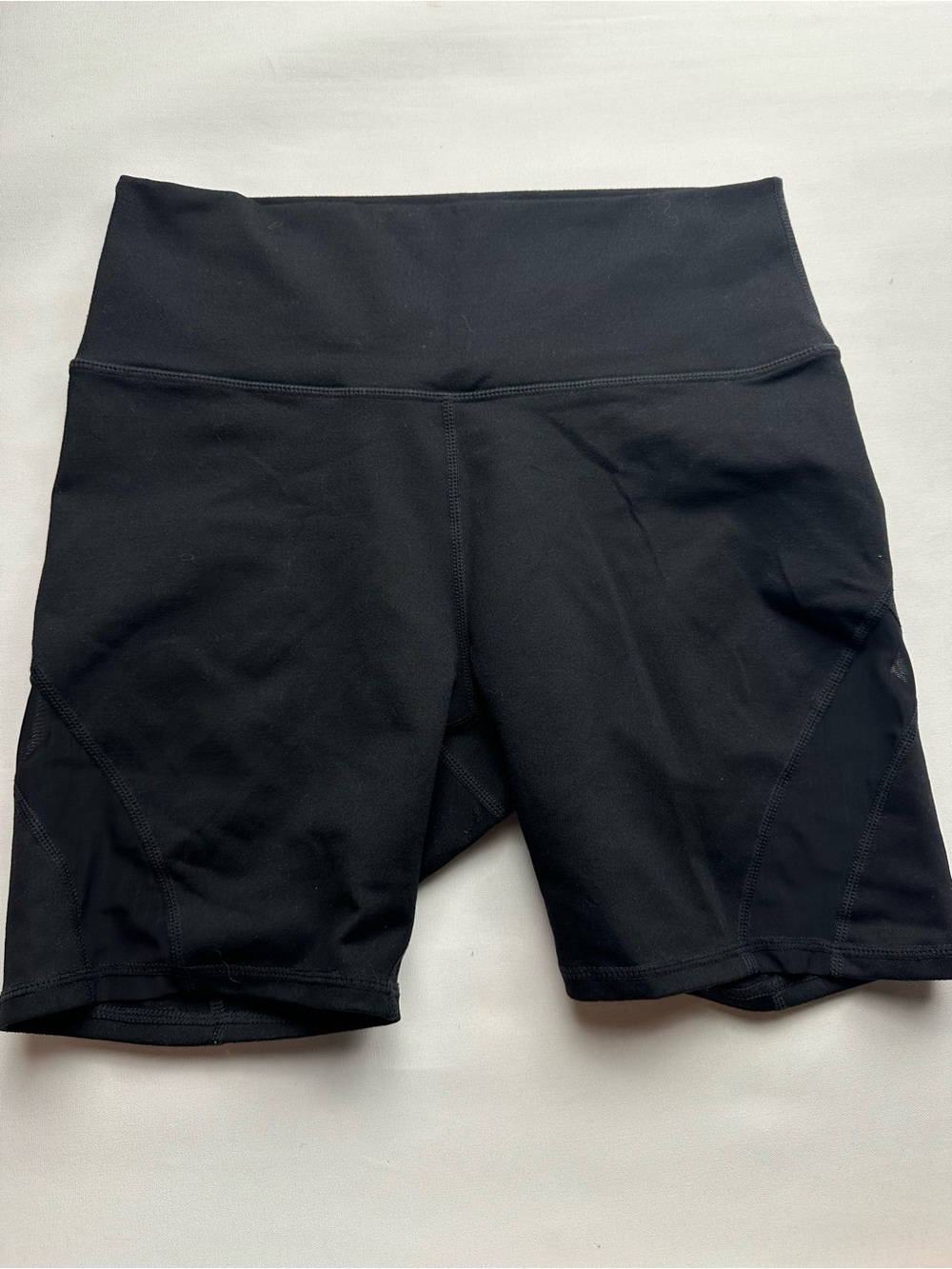 High-Waist Black Women’s Fabletics powerhold biker Shorts. Est size S